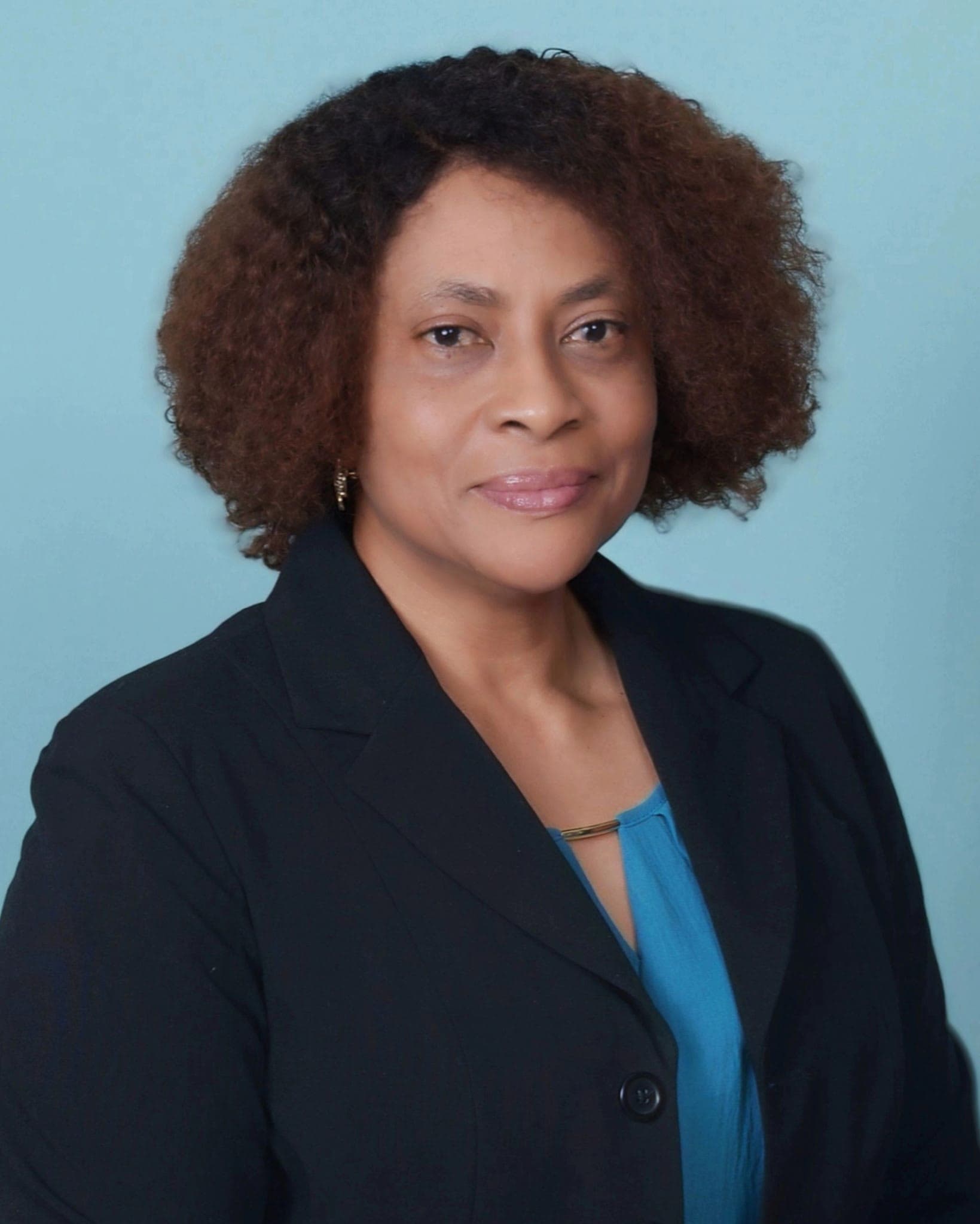 Dr. Genevieve Ufongene in a clinical setting